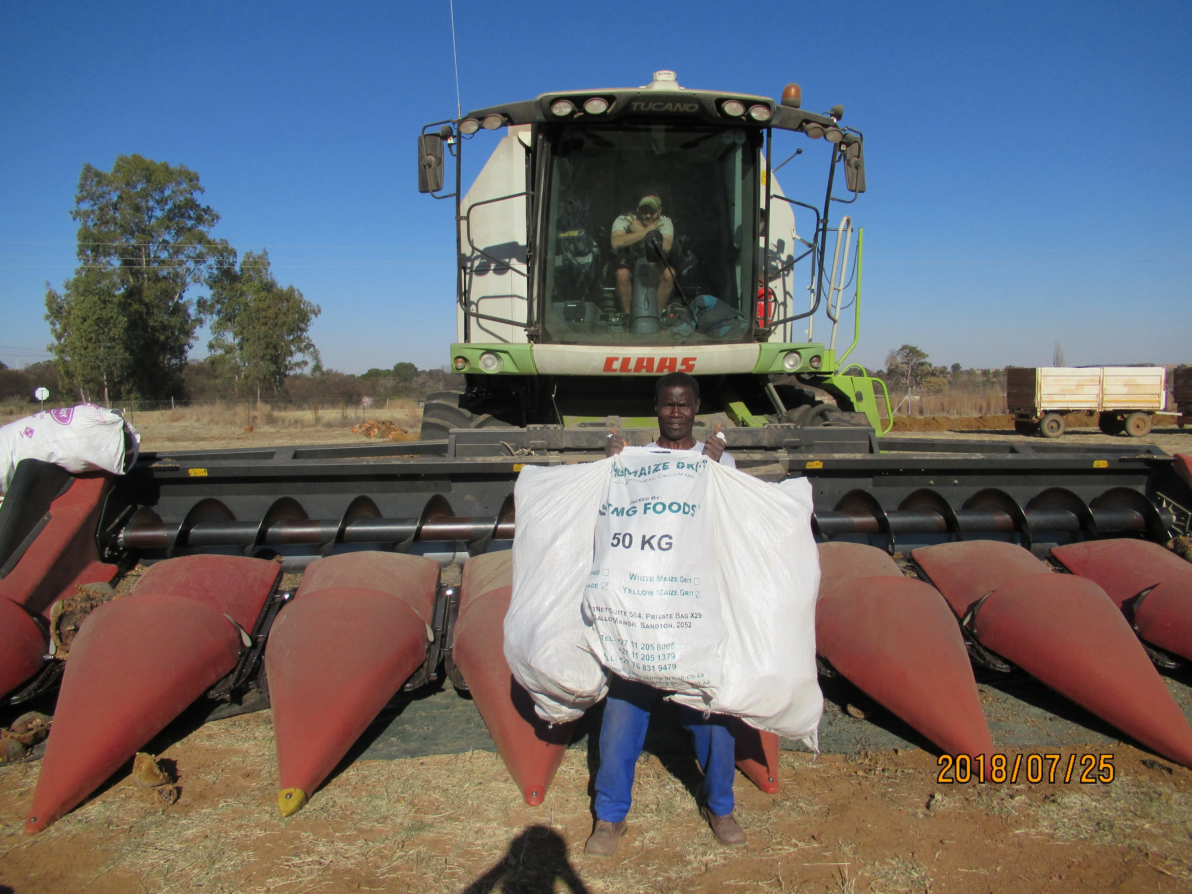 Harvest machine ready to harvest corn