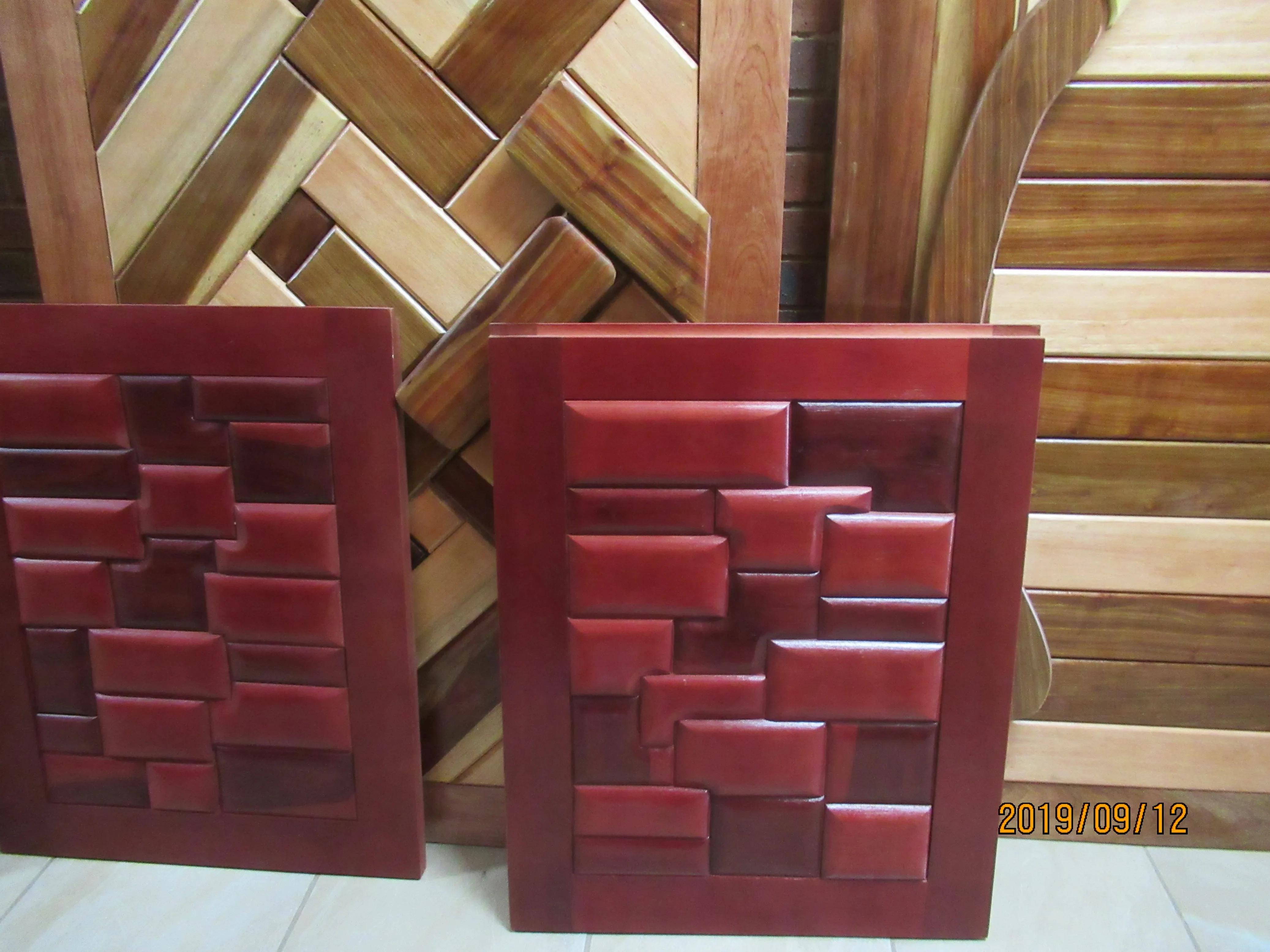 Doors made at St bonaventure centre out of various woods and colors 